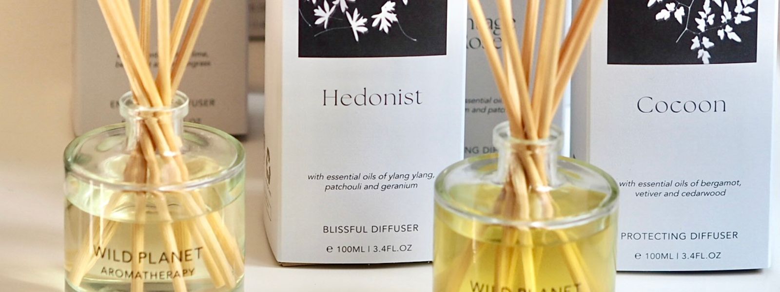 reed diffuser bottles and boxes by Wild Planet Aromatherapy