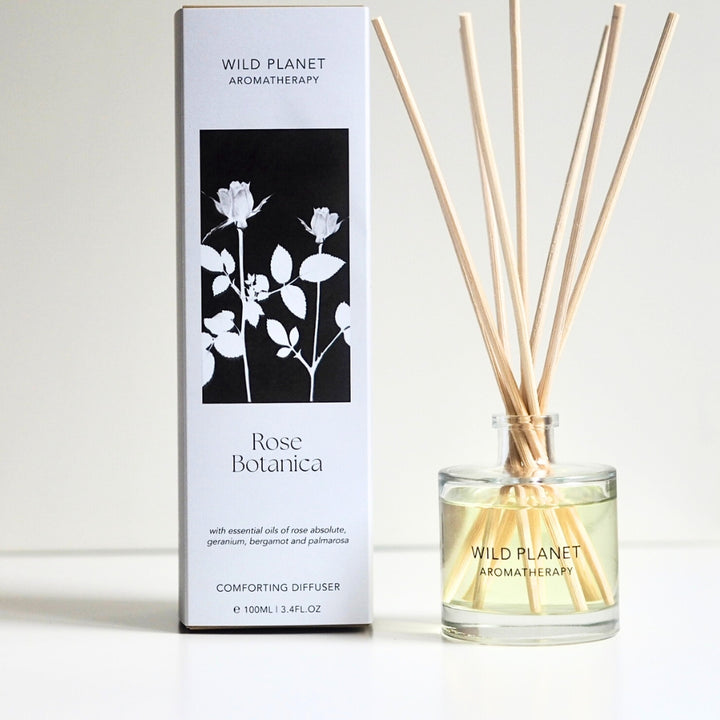 Rose Botanica Natural Floral Reed Diffuser on white background by Wild Planet Aromatherapy