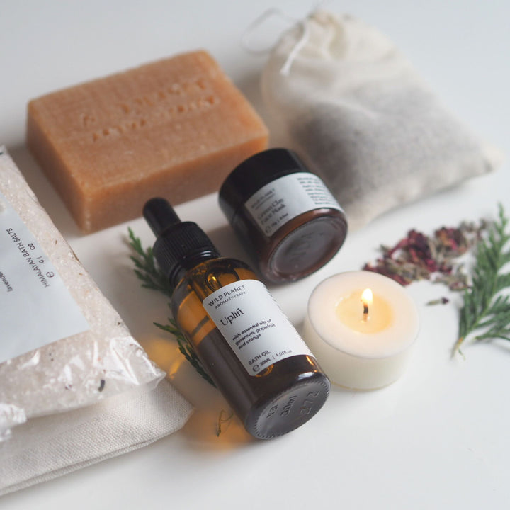 Soap bar, bath salts, lavender in cotton pouch, bath oil, french green clay face mask, tea light 