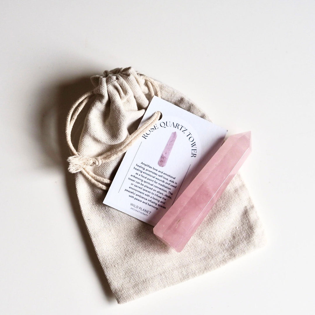 Rose Quartz Crystal Tower with pouch and information card, white background Wild Planet Aromatherapy