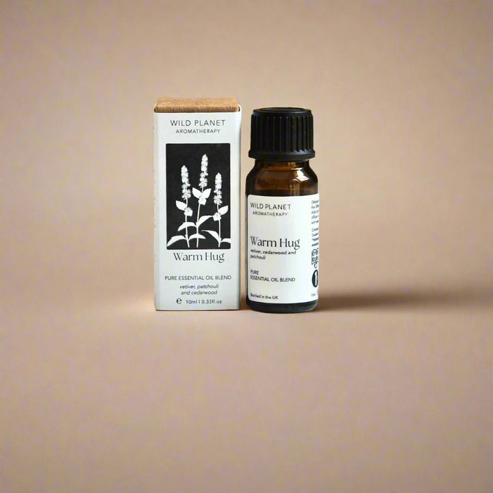 Warm Hug comforting essential oil blend bottle and box by Wild Planet Aromatherapy